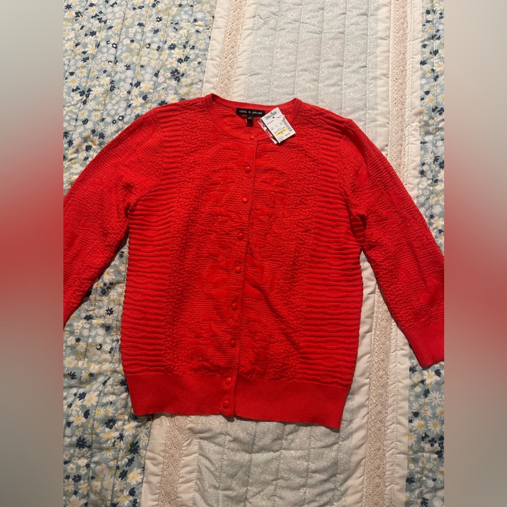 Nice orange thin sweater button up or open, looks great with jeans or skirt.